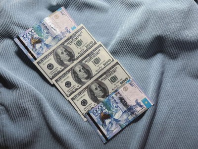 Средневзвешенный курс доллара на бирже составил 515,06 тенге