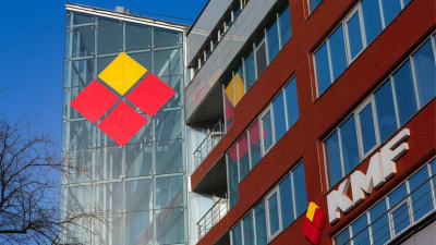 Как происходило преобразование KMF в акционерное общество
